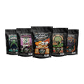 Five bags of four ounce coffee that are flavored with themes from Fall. From left to right their names are Frankenbones, Blackberry Cobbler, Frosted Pumpkin Roll, Apple Cider Donut, and Jacked o Lantern.