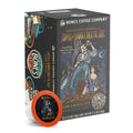 The front of the Bones Coffee Company Army of Dark Chocolate 12 Count Bones Cups box. Its flavor is dark chocolate, and it has a skeleton wielding a chainsaw standing on dark chocolate with a woman clinging to its leg on the art.