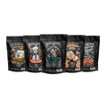 Five four ounce bags of coffee are lined up. From left to right their names are Salted Caramel, French Toast, Salty Siren, Cinnamon Roll, and French Vanilla.