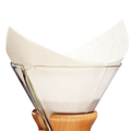 A Chemex bonded filter resting inside a Chemex 6-cup classic.