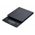 A Hario drip scale and timer.